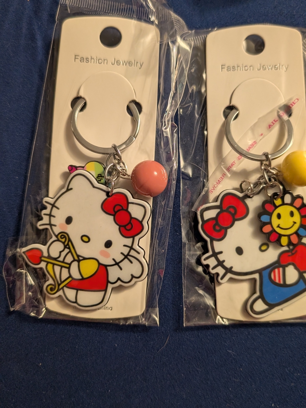 2 Sanrio Hello Kitty Key & Card Holder Charms